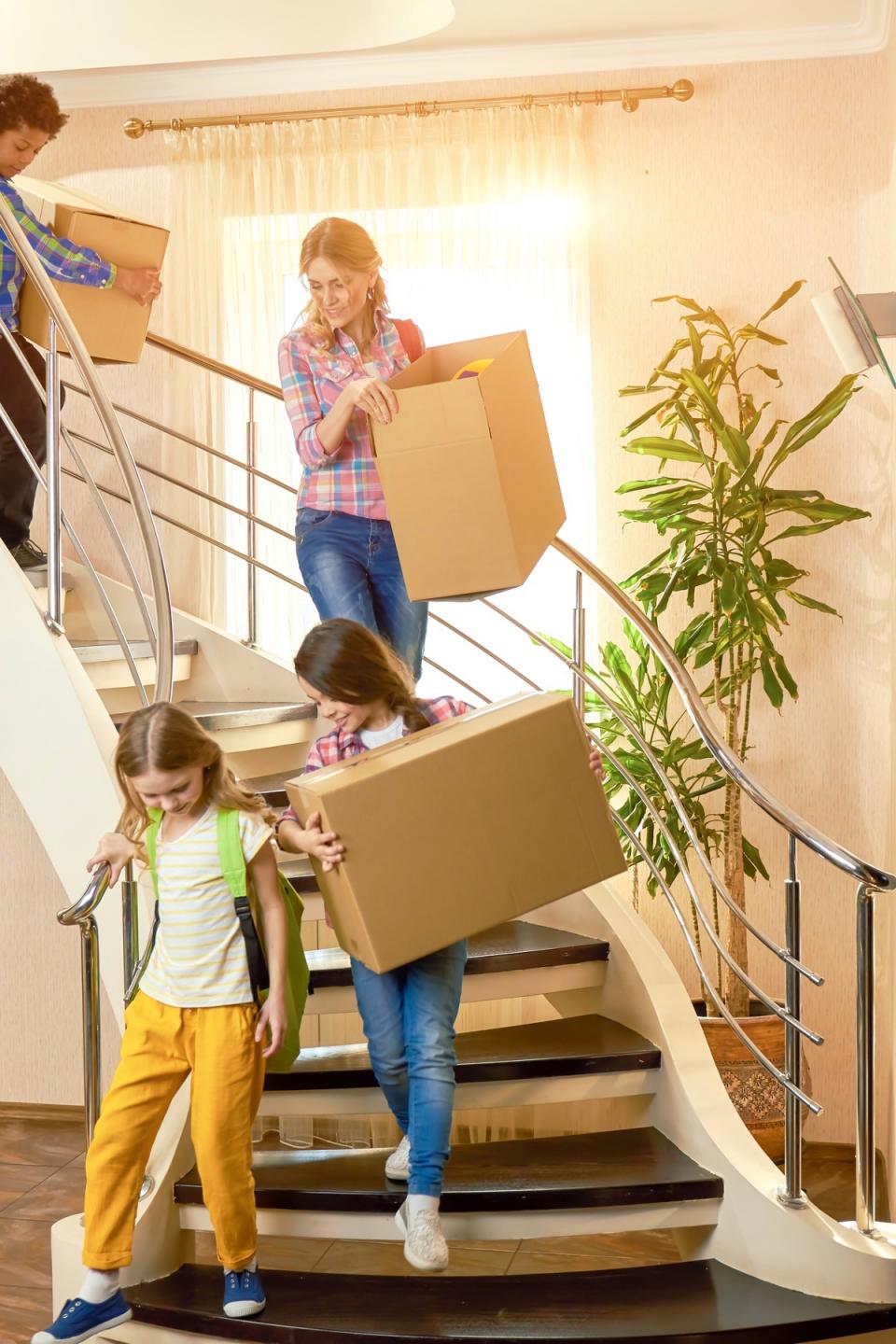 A family gets ready to move to a new home. 